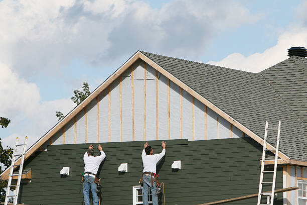 Professional Storm Damage Siding Repair technician working in Indiana, IN